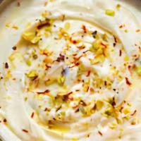 Shrikhand · Creamy Indian pudding made of yogurt, pistachio, cardamom & saffron.