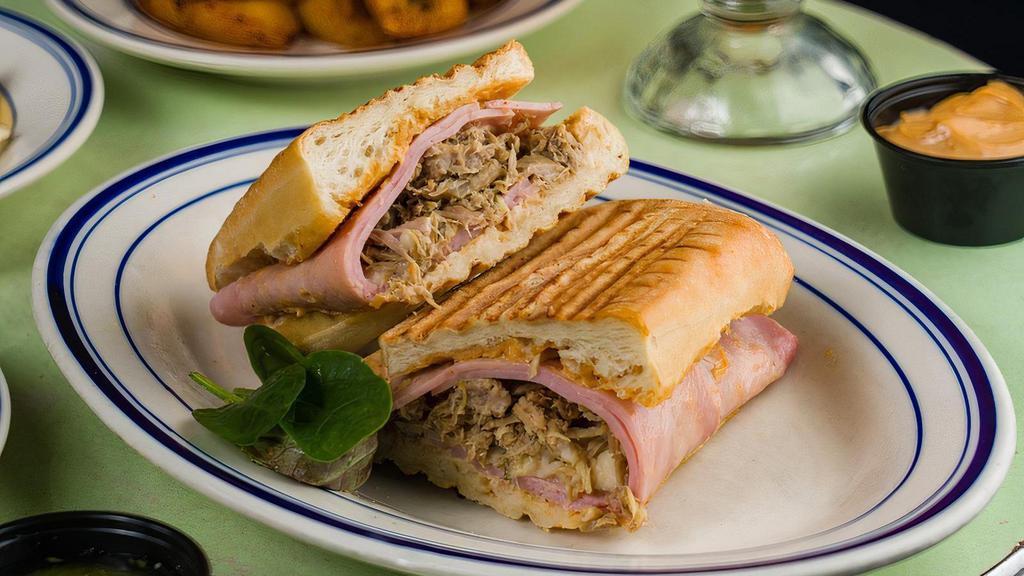 Cuban Sandwich · Nyc's favorite citrus marinated roast pork, ham, swiss cheese, pickle & chipotle mayo