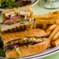 Grilled Chicken Torta Combo · Grilled chicken, black bean spread, lettuce, tomato, red onion, chipotle mayo on a toasted r...