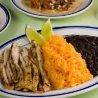 Grilled Chicken Cutlet Plate · Chicken marinated in citrus, cilantro, shallots, soy and garlic. Served with rice & beans
