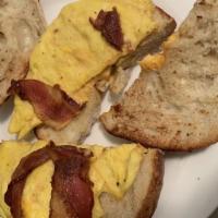 Two Eggs With Bacon, Ham, Or Sausage Sandwich · 