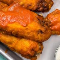 Dry Rubbed Chicken Wings (7) · buffalo style with blue cheese sauce or honey bbq with house ranch