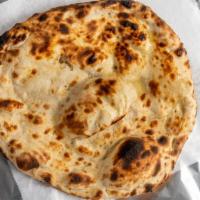 Tandoor Oven Flatbread, Plain · Flat bread baked in clay oven, with butter.