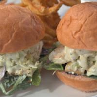 Fresh Fish Sliders W/ Mac Salad And Rice · Fresh Ono fish with passion fruit guava buns and pineapple coleslaw and our own mango lime  ...