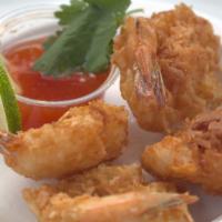 #1 Coconut Shrimp App · 4 Piece of golden Coconut shrimp and our sweet chili sauce