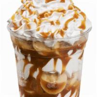 Bananas Foster Sundae Dasher · Layers of bananas, vanilla ice cream and caramel topped with whipped cream and caramel drizz...