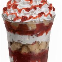 Strawberry Shortcake Sundae Dasher · Layers of vanilla ice cream, strawberries and pound cake topped with whipped cream and straw...