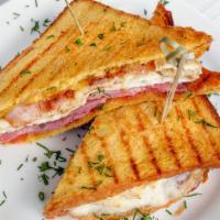 Egg, Cheese And Bacon Sandwich · Delicious sandwich made with two eggs, cheese and choice of meat.