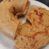 Peanut Butter And Jelly Sandwich · Delicious sandwich made with peanut butter and jelly on a toasted bagel.