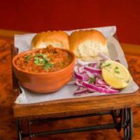 Pav Bhaji · Mumbai style vegetables cooked with Indian spices served with bread & onions.