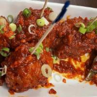 Vegetable Manchurian · Jain, Vegan. Vegetable fried dumplings tossed in spicy tangy sauce & Indo Chinese flavored s...