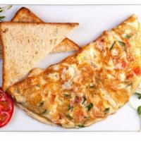 Ham Omelette Platter · Delicious omelette with yummy ham served with home fries and toast.