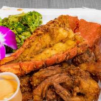 Seafood Platter · Comes with jerk fried shrimp, southern fried shrimp, southern fried lobster tail, and 2 sides.