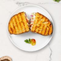 Tuna Twist Panini  · Tuna and melted cheese on your choice of toasted bread.