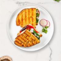 Veggie Club Panini · Fresh mozzarella, plum tomatoes, spinach and sun-dried tomatoes on your choice of toasted br...
