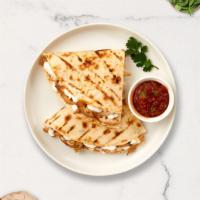 Philly Melts Quesadilla  · Onions, peppers, mozzarella cheese, and cheddar cheese in a grilled tortilla.