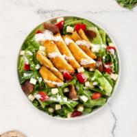 Chicken Crunch Cobb Salad · Chicken cutlet, hard boiled egg, cheddar cheese, tomato, bacon bits, ranch dressing, and let...