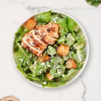Chicken Caesar Salad · Grilled chicken, lettuce, parmesan cheese, croutons, tomato, and Caesar dressing.