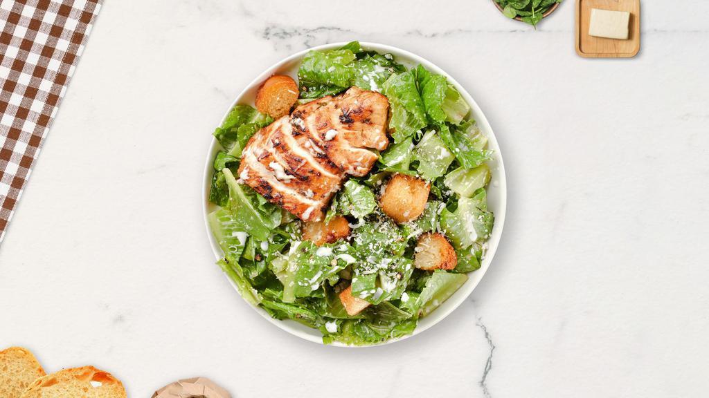 Chicken Caesar Salad · Grilled chicken, lettuce, parmesan cheese, croutons, tomato, and Caesar dressing.