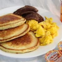 Pancakes · w/2 eggs, choice of bacon, sausage or ham ,choice of 8 oz.reg.coffee,reg. sm. tea or sm. juice