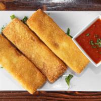 Polenta Fries · cheesy fried polenta served with ketchup