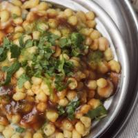 Chole Chaat · Gluten-Free. Boiled chickpeas tossed with onions, potatoes, tangy & spicy chutney, spices & ...