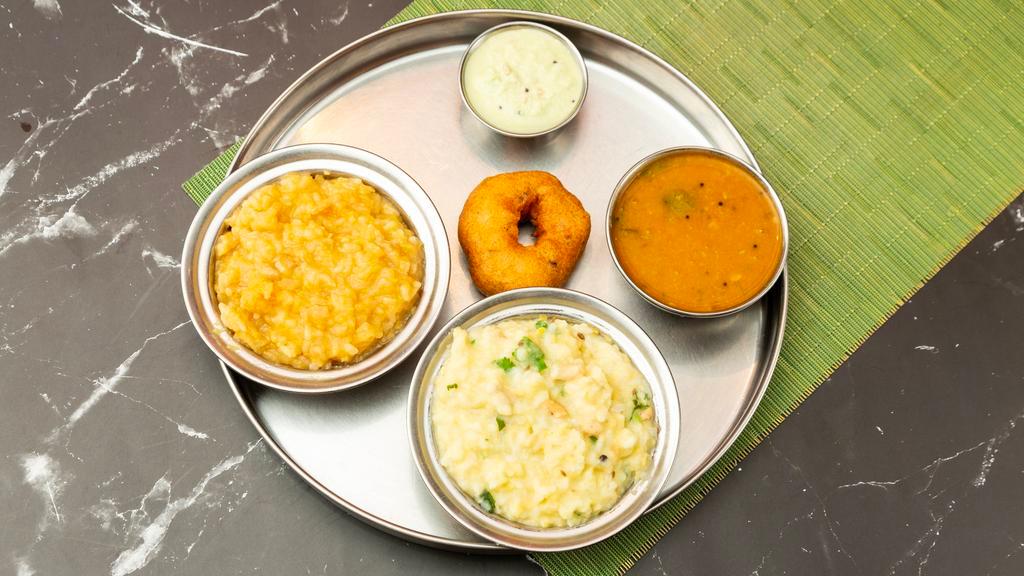 Pongal Special · Special rice and lentils dish, served both sweet & spicy, medu vada (1 pc) & served with sambar, coconut chutney & raita.