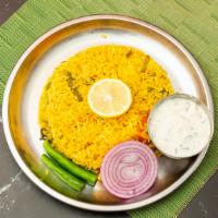 Mixed Vegetable Biryani · Basmati rice cooked with spiced vegetables &
served with raita.