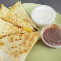 (B). Breakfast Quesadilla · eggs & mix cheese with choice of meats or veggies.
Comes with salsa and sour cream.