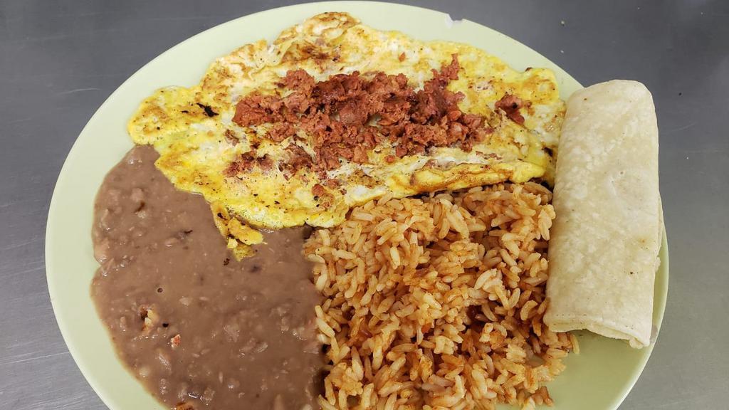 (D). Chorizo With Eggs Platter · Mexican sausage mix with eggs over rice and beans and two corn tortillas.
