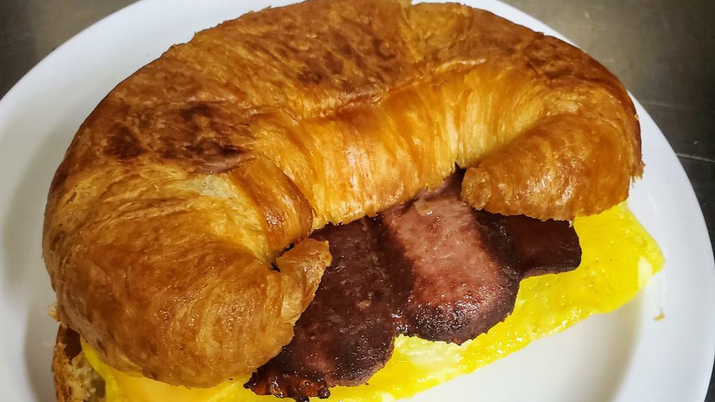 Croissant Sandwich · All croissants are served with egg & cheese. Your choice of bacon, ham, turkey, salami,
or just an egg & cheese croissant.