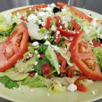Greek Salad · Feta, olives, lettuce, tomatoes, onion, peppers,cucumber mix with oil and vinegar, salt, pep...