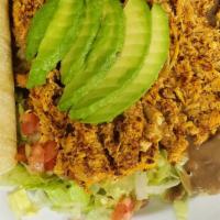 Tinga Platter · Tinga (spicy shredded chicken) with avocado,rice,salad,beans & three corn tortillas