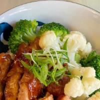 Chicken Teriyaki · chicken teriyaki over rice w/ broccoli & cauliflower