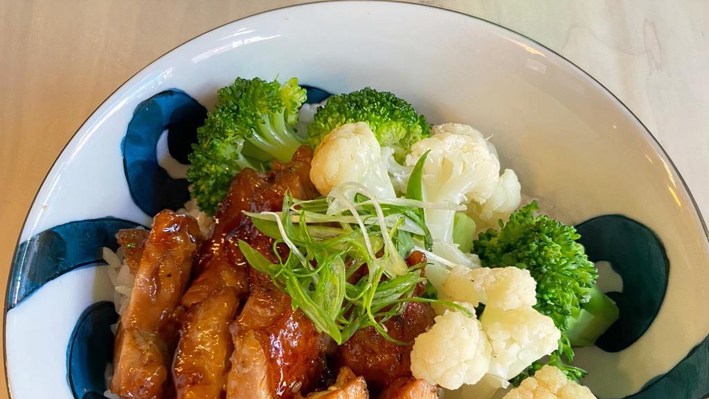 Chicken Teriyaki · chicken teriyaki over rice w/ broccoli & cauliflower