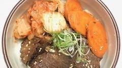 Short Rib Beef Rice Bowl · Slow-cooked short rib over rice, kimchi, and carrot.