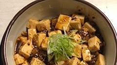 Mapo Tofu Rice Bowl · Spicy soft tofu over rice and shitake mushroom. No meat.