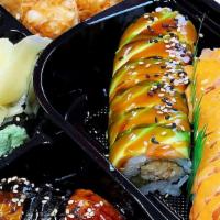 Bento Box C · Shrimp sushi, eel sushi, dragon roll, m16 roll, shumai, miso soup, seaweed salad, and kani s...