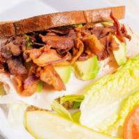 Turkey Blt Sandwich · Turkey, lettuce, tomato, and bacon.