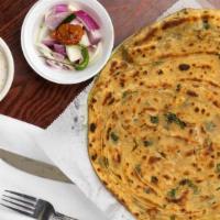 Plain Parantha · Served with raita and pickle.