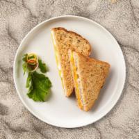 Great Great Grilled Cheese · A mix of cheeses placed in between two buttered pieces of bread and grilled until golden bro...