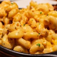 Mac N' Cheese With Jerk Chicken · Freshly prepared Mac N' Cheese dish, just oozing with cheezy goodness. Mixed with perfectly ...