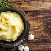 Garlic Mashed Potatoes · Buttery delicious Mashed potatoes, topped with garlic seasoning.