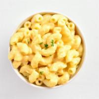 Classic Mac N' Cheese · Freshly prepared Mac N' Cheese dish, just oozing with cheezy goodness.