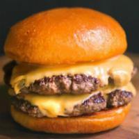 Double Meat Cheese Burger · 2/ 8 oz Angus beef patty extra juicy.