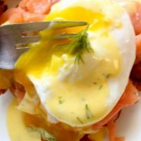 2 Egg Benedict With Lox Over 2 Potato Latkes · Over potato latkes smoked salmon with over medium egg topped with hollandaise sauce.