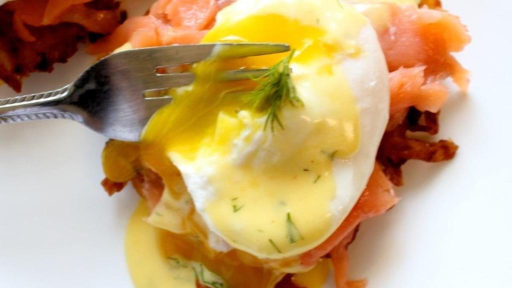 2 Egg Benedict With Lox Over 2 Potato Latkes · Over potato latkes smoked salmon with over medium egg topped with hollandaise sauce.
