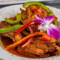 Chicken Creole · Stewed with onions and bell peppers in creole sauce.