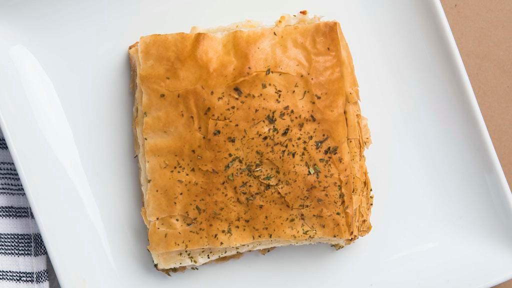 Tirotipa · Cheese pie with feta & herbs baked in phyllo dough.
