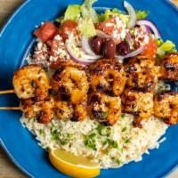 Shrimp Souvlaki (2 Pc) · Sticks of grilled shrimp seasoned with herbs. Includes a choice of rice or fresh cut fries, ...